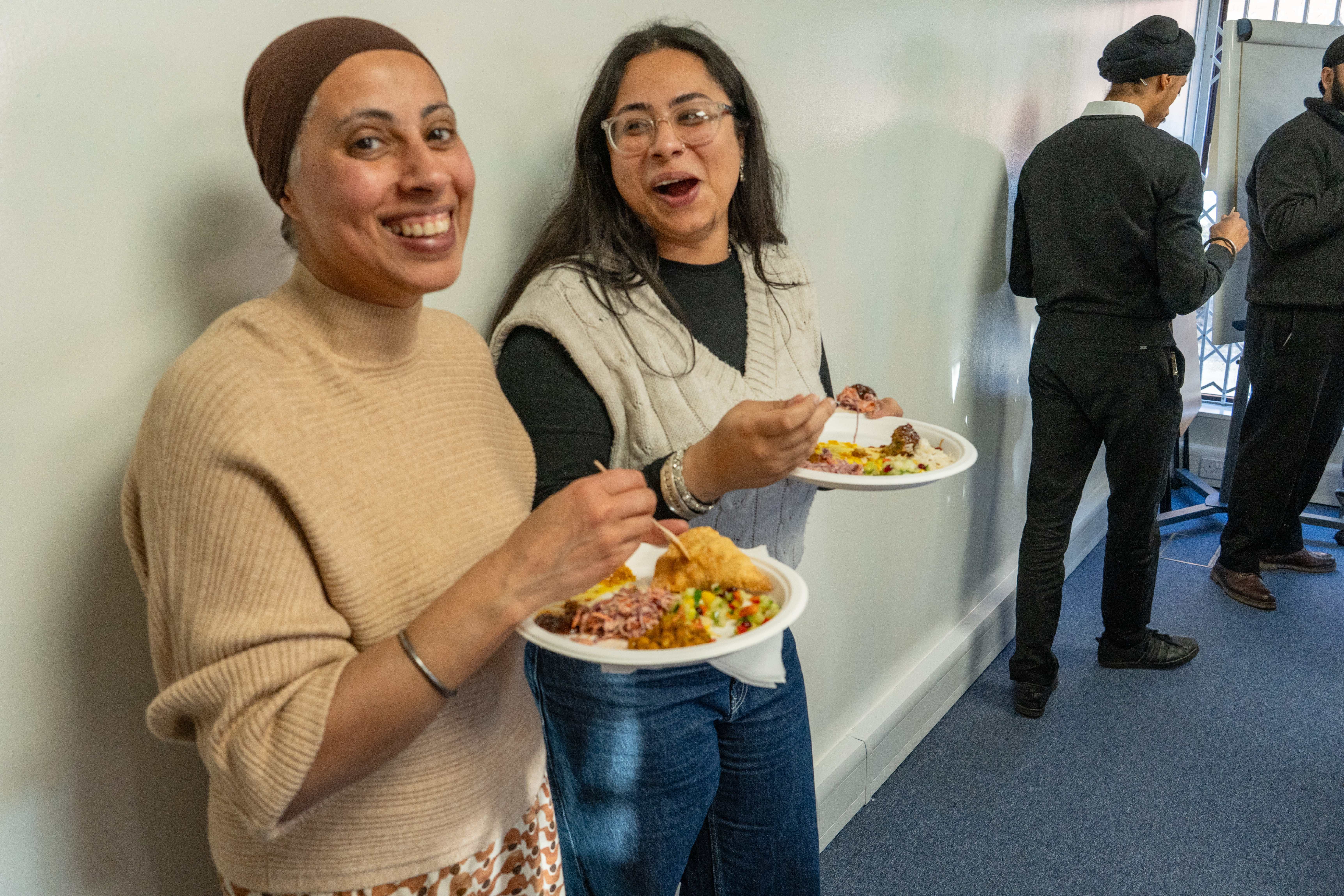 Laja's Kitchen team serving delicious homemade Indian food
